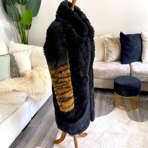 Long faux fur coat with tiger striped sleeves